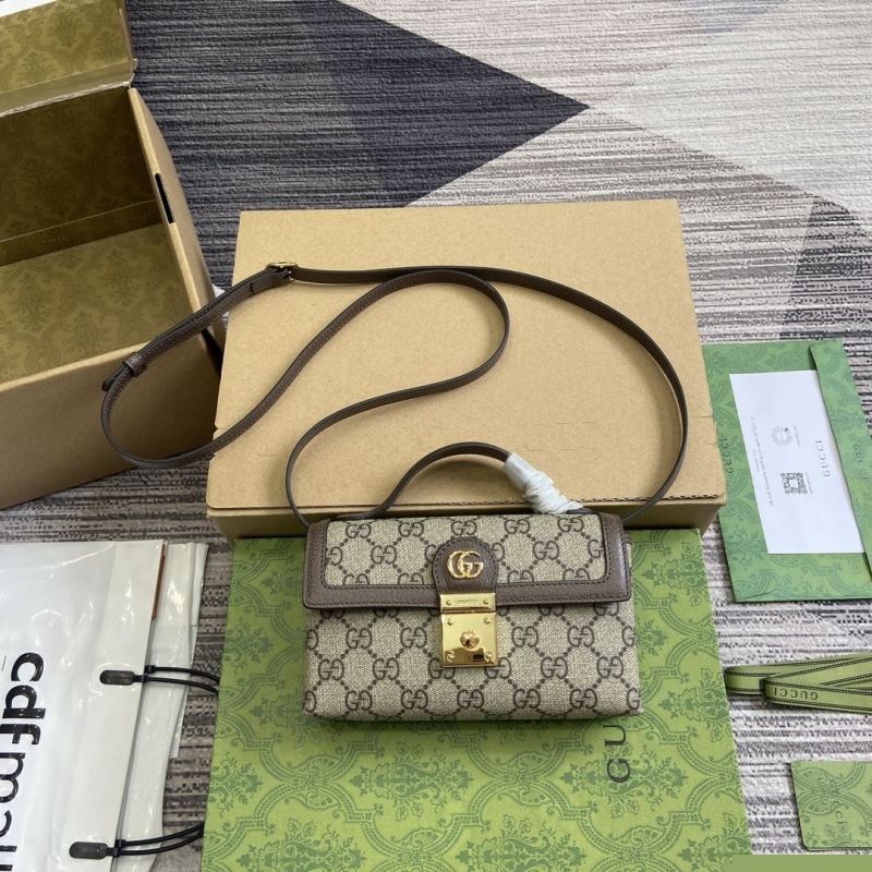 G*u*i top handle bags